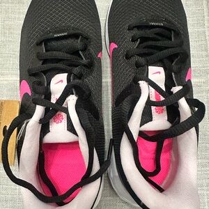 Nike Black and Pink Athletic Shoes with Modern Design